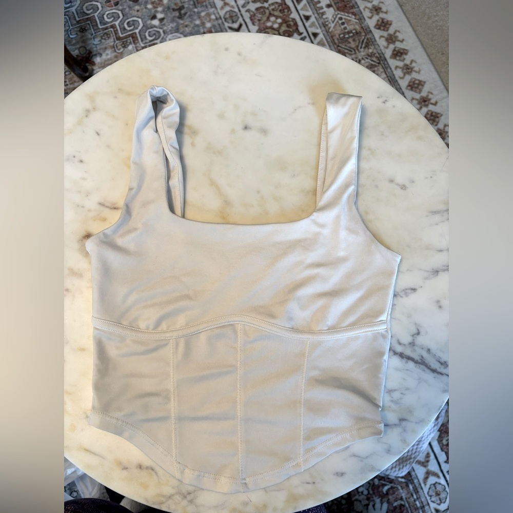 White sports bra/top size extra small live in the moment brand.